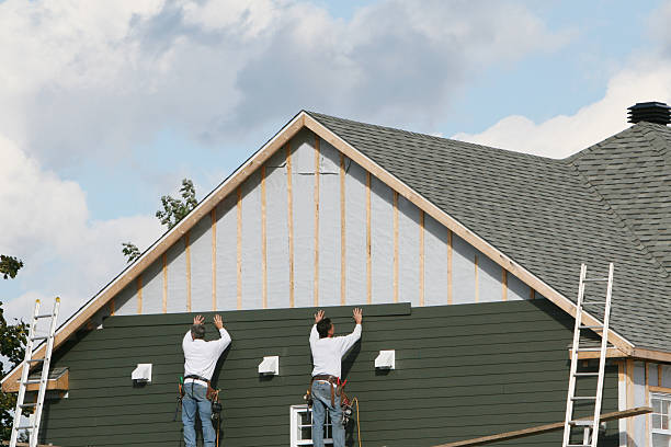Professional Siding Installation technician working in Seaford, VA